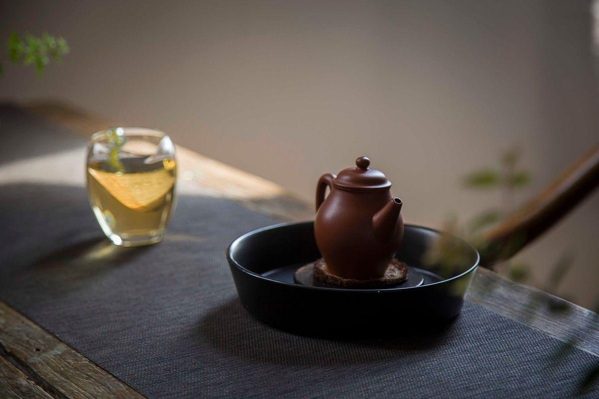 red enameled pottery teapot